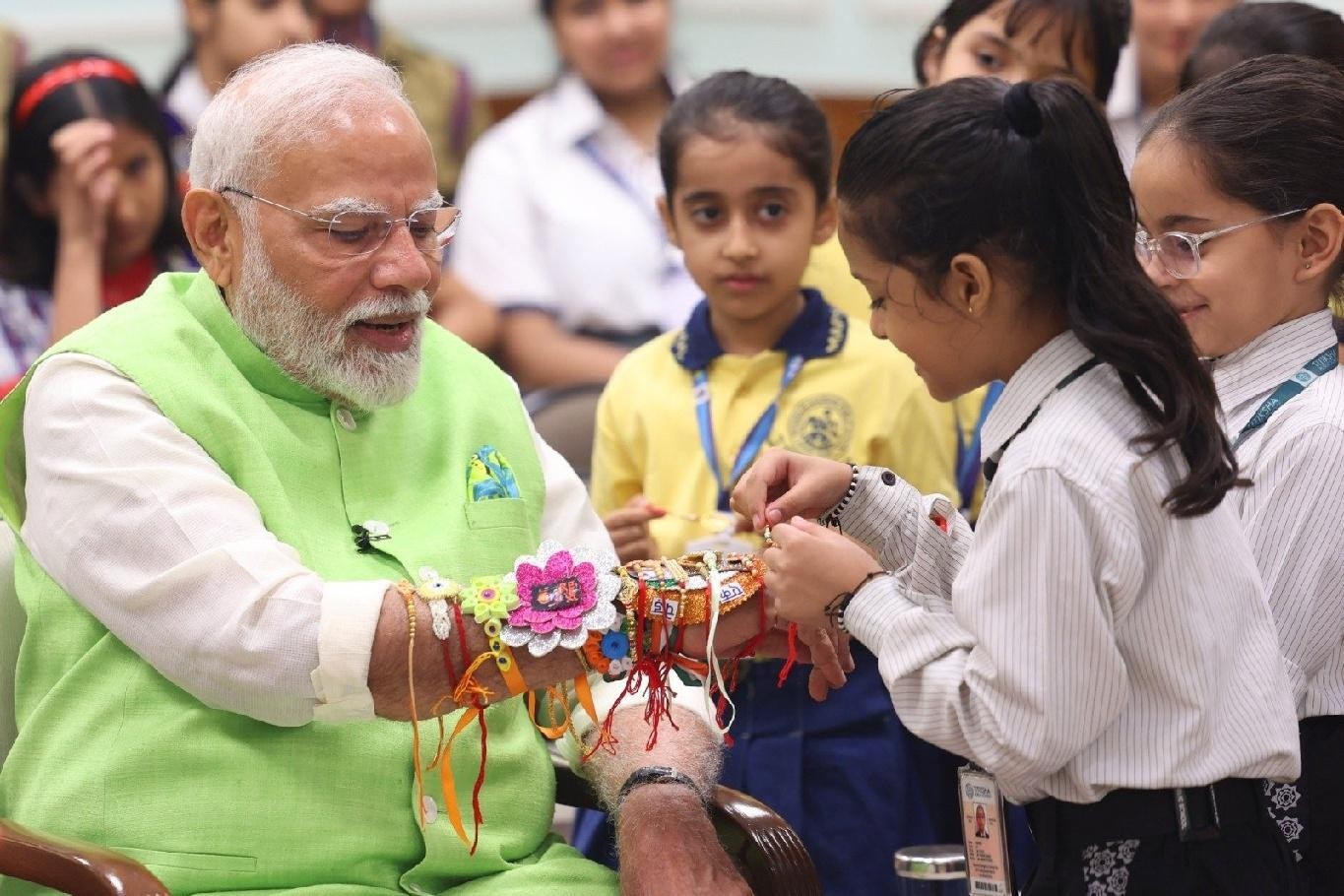 PM Modi Celebrates Raksha Bandhan with School Girls, Shares Festive Joy from His Residence